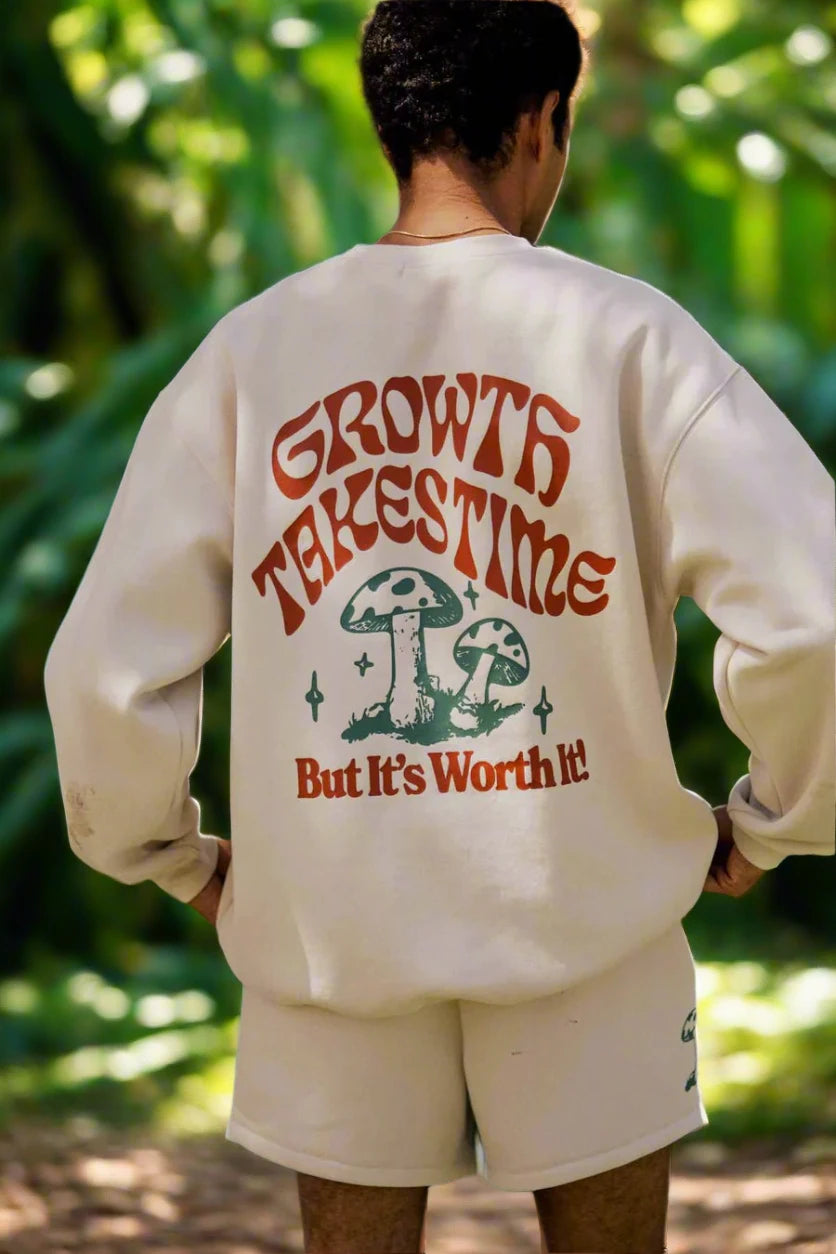 Mayfair Growth Takes Time Crewneck Sweater as seen on Courtney Green